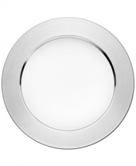 The glint of a stainless steel Sarpaneva plate is a chic surprise amid the standout dinnerware patterns of Iittala.