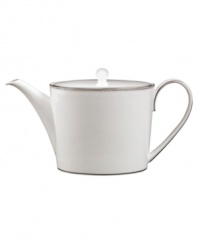 Set a dazzling tea or coffee service with this fine china teapot. From innovative designer Monique Lhullier, it features a platinum-edged tiered scallop pattern on creamy white.