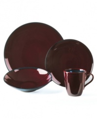 Minimal strokes of brilliant glaze add stylish depth and folky charm to Mikasa's coupe dinner plates. (Clearance)