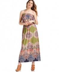 A vibrant, colorful print gives Sunny's Leigh's smocked maxi dress a lush, exotic feel. Removable shoulder straps offer a seamless transition from day to night.