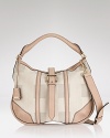 Burberry's leather-trimmed hobo is office perfect. A muted palette ensures it complements all your workday favorites.