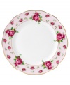 Revive a classic dinnerware pattern with the Vintage dinner plate. Lush blossoms plucked from Royal Doulton's Old Country Roses collection flower on pink bone china with a ruffled gold edge.