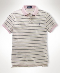 Designed for a comfortable, classic fit from breathable cotton jersey, a handsome short-sleeved polo shirt is finished with a preppy striped pattern