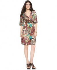 ECI mixes prints and bold beading to maximum effect! This kimono-style dress works for day or night.