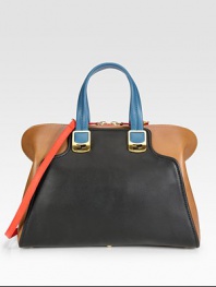 An impeccably tailored silhouette of supple colorblock leather, finished with dual straps for versatility.Double top handles, 5½ dropDetachable adjustable shoulder strap, 18-24½ dropTop zip closureProtective metal feetOne inside zip pocketTwo inside open pocketsCotton lining15W X 11H X 6½DMade in Italy