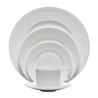 Urban chic and elegance are the hallmarks of the new Intaglio collection from Wedgwood, yet drawing its design inspiration from the delicate embossing of the Georgian era, the fresh white color way is crisp, clean and contemporary. Intaglio highlights the traditional skills of knurling and engine turning, the arts of indenting designs in wet clay to give a distinctive tactile finish. The designs are unique across all the pieces and bring an intricate web of fresh but understated silhouette to the table.