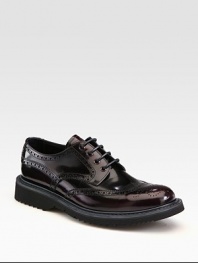 Leather wing-tip style with rubber sole and colored micro detail.Leather upperLeather liningRubber soleMade in Italy
