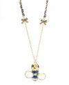See what all the buzz is about. Betsey Johnson's long bee pendant is as sweet as honey. Crafted from antique gold-plated mixed metal with a blue and white striped grosgrain ribbon, petite bow charms, and a crystal-accented blue striped bee. Approximate length: 30 inches + 3-inch extender. Approximate drop: 2 inches.