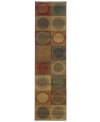 Cool and casual, this winsome area rug expresses a fashionable story full of character and color. Top to bottom, side to side, vibrant circles are mixed and matched with deep reds, blues and greens. Crafted with durable nylon, this captivating piece will be a long-lasting fixture of softness and allure in your home.