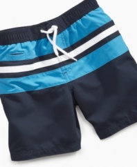 Step up his fun with stripes! He'll be comfy for plenty of playtime in these cute swim trunks from Greendog.