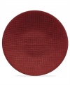 Sleek and simple in rich garnet stoneware, the Red Pepper salad plate provides contemporary style for casual dining with an intriguing all-over texture. (Clearance)