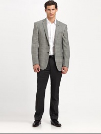 A smartly checked houndstooth pattern dresses up this impeccably tailored piece.Notched lapelButton frontFlap pocketsButton cuffsFully linedAbout 31 from shoulder to hem98% wool/2% lycraDry cleanImported
