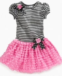 Pretty in pink. She can spin and dance with the funny frilly ruffles on this tutu dress from Bonnie Jean.