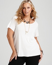 This timeless Eileen Fisher tee gets a luxurious lift in flowing silk--an elegant canvas for shimmery accessories.