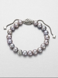 From the Spiritual Bead Collection. Luminous grey freshwater pearls on a sterling silver box chain with sterling silver cabled bead accents. 8mm grey freshwater pearlsSterling silverDiameter, about 7.75 adjustableBead closureImported 