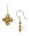 An ornate floral pattern formed from beautiful 14-karat gold, Swarovski crystals, and bronze beads, Miguel Ases' drop earrings are a captivating jewelry choice.