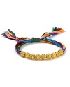 The classic friendship bracelet has officially gone glam. Shashi adds boldly hued cord and a row of gleaming Nepali gold beads for a look that's totally bright now.