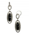 Black magic. Judith Jack's elegant earrings feature oval-shaped onyx stones (9 mm) surrounded by dazzling marcasite and crystal accents. Crafted in sterling silver. Approximate drop: 2-5/8 inches.