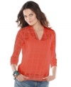Semi-sheer fabric with a tonal plaid print makes an ethereal impression on this peasant-style top from Tommy Hilfiger.