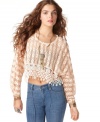 Pair Free People's crochet top over your fave bandeau or tank for a totally 1970's look ... high waist jeans & boots complete the ensemble.