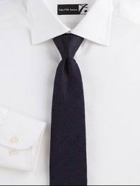 Sophisticated design with subtle signature gancini print, crafted in luxurious Italian silk.SilkDry cleanMade in Italy