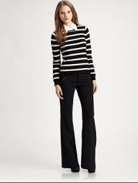 Bold stripes give the right graphic punch to this soft, stretch-wool pullover, styled with a mock point collar that embrace's Alice + Olivia's sophisticated yet always playful attitude.Long sleevesRibbed trimPullover styleBody: 85% wool/15% spandex; trim: cottonDry cleanImported of Italian fabricModel shown is 5'8½ (174cm) wearing US size Small.