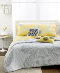 A grand presentation with a modern twist. This Victoria comforter set features a traditional flourish pattern in tonal hues with pops of black and yellow for a whimsical, contemporary touch.