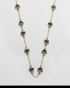 A charming piece with enamel accented stations on a link chain. EnamelGoldtoneLength, about 32Slip-on styleImported 