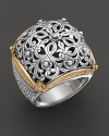 Bold flourished of 18K yellow gold enrich this ornate sterling silver ring from Konstantino.
