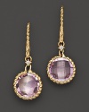Faceted amethyst adds brilliant color to intricately detailed 18K yellow gold. By Roberto Coin.