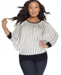 So cool: One 7 Six's plus size sweater puts a new take on pinstripes! Wear it with everything from a chic skirt to your favorite jeans!