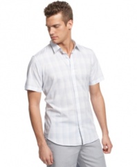 Slim down your summer look with this slim fit shirt from Calvin Klein.