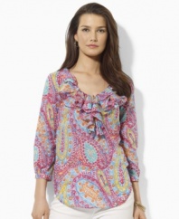 A beautifully bright paisley pattern lends breezy charm to Lauren by Ralph Lauren's top, designed in light-as-air cotton voile with puffed sleeves and voluminous ruffles for a graceful touch.