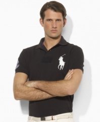 Cut for a trim, modern fit from breathable cotton mesh, this iconic short-sleeved polo shirt is designed exclusively for Ralph Lauren's collection celebrating the Wimbledon Championships.