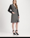 Power dressing in its finest form, this tailored, wool-rich coat has modern seaming, croc-print faux leather sleeves and a back vent for comfort. V-neckCroc-print faux leather sleevesSlash pocketsBack ventAbout 39 from shoulder to hem80% virgin wool/20% polyamideDry cleanImported of Italian fabricModel shown is 5'10 (177cm) wearing US size 2.
