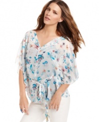 A watercolor floral print adds a flair of femininity to this RACHEL Rachel Roy chiffon blouse -- perfect for a light summer look!