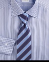 A suit-defining silk tie crafted with wide stripes. Silk Dry clean Made in Italy 