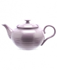 Celebrated chef and writer Sophie Conran introduces dinnerware designed for every step of the meal, from oven to table. A ribbed texture gives this mulberry Portmeirion teapot the charm of traditional hand-thrown pottery.