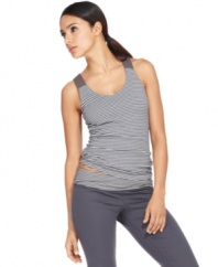Get active in this easy crossback tank top from Ideology. Chic stripes add style; a built-in shelf bra lends support!