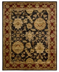 Rich with color and refined floral motifs, this Nourison area rug offers luxury for any space. Soft, durable wool is tufted by hand and herbal-washed for a beautiful, heirloom-quality texture and sheen.