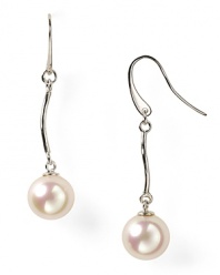 Luminous and versatile. Pearls are always a classic, and this pair of drop earrings from Majorica is a delicate way to wear them.
