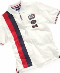 Start your engines. He'll never tire of the sleek modern style on this half-zip polo shirt from Tommy Hilfiger.