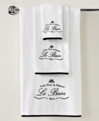 Parisian-inspired elegance transforms the bathroom with this Le Bain hand towel from Kassatex, featuring beautiful Egyptian cotton embellished with embroidered French words for a classic and refined look.