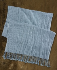 Inspired by the uniforms of old railroad workers, this lightweight scarf features a washed-out stripe pattern and fringed edges for a vintage-inspired addition to any ensemble.
