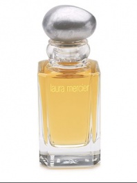 It's the magic hour, the brief moment of extraordinary light that bathes our world right before sunset called L'Heure Magique. This instant of infinite softness and warmth is captured in a beautiful new fragrance of the same name. A sheer oriental essence lit by floral, woodsy and musky qualities. 1.7 oz. Made in USA. 
