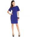 T Tahari updates a sophisticated sheath dress with fluttery bell sleeves and an exposed back zipper. The details make it modern, but the classic silhouette keeps it pretty and polished for the office.