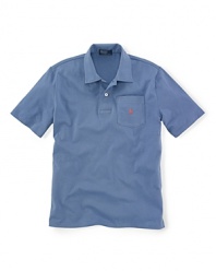 An adorable pocketed polo shirt is crafted from super-soft cotton jersey for a breathable, comfy fit.