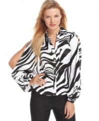 Split sleeves and a fierce zebra print elevate this button down blouse from classic and understated to modern and bold! From XOXO.