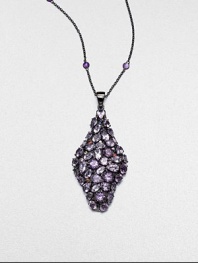 A diamond-shaped pendant encrusted with faceted amethyst stones and accented with multi-colored sapphires on an amethyst station necklace on a rhodium-plated sterling silver link chain. AmethystMulti-colored sapphiresRhodium-plated sterling silverLength, about 29Pendant size, about 2.6Clasp closureImported 