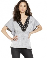 Sequin Hearts' V-neck top looks ultra-chic with lace embellishments. Pair it with skinny jeans and wedges for a model-inspired outfit.